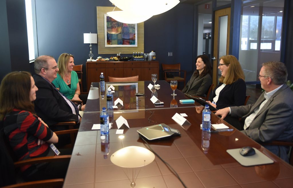 Conference Room with people talking in it